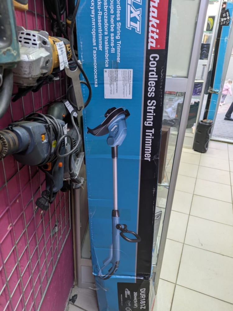 Триммер Makita UF501